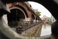 Across from Akihabara’s electronics district, the red-brick viaduct along the Kanda River is all that remains of Manseibashi Station, once among Tokyo’s grandest landmarks. | JOHAN BROOKS