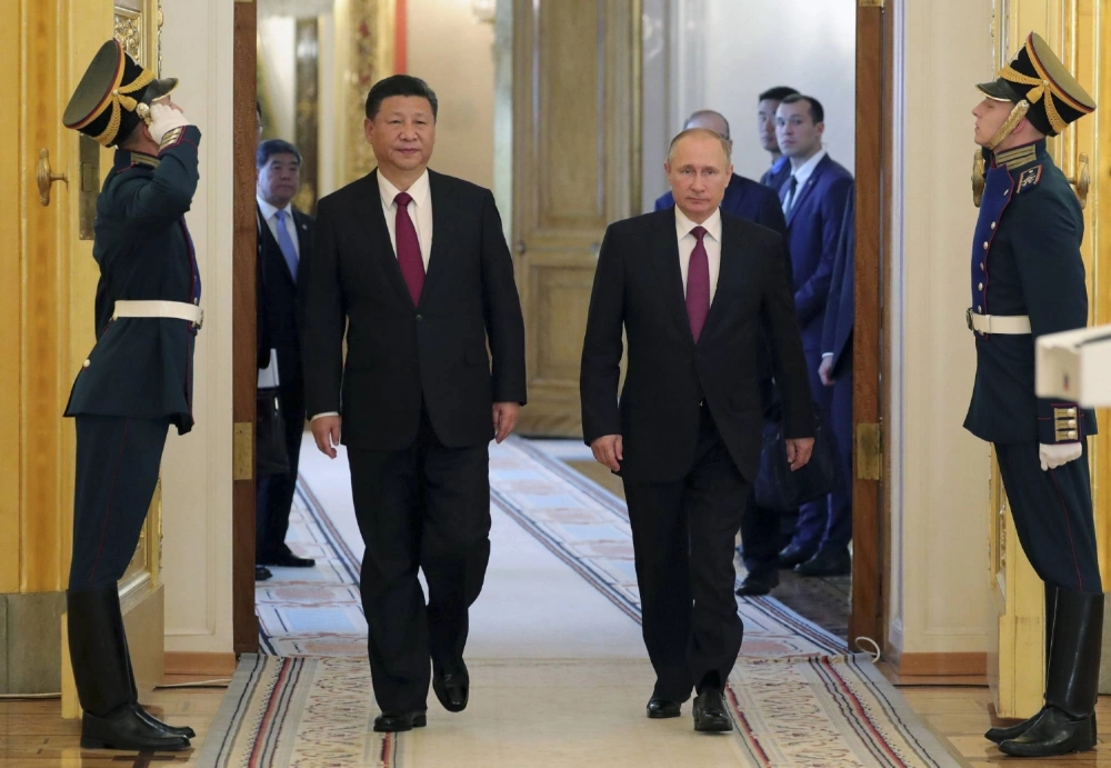Russian President Vladimir Putin and his Chinese counterpart, Xi Jinping, meet at the Kremlin in Moscow in July 2017.  Since Russia’s 2022 invasion of Ukraine, the West — especially Europe — has come to see China not just as an economic competitor but as a hard security challenge. Russian President Vladimir Putin and his Chinese counterpart, Xi Jinping, meet at the Kremlin in Moscow in July 2017.  Since Russia’s 2022 invasion of Ukraine, the West — especially Europe — has come to see China not just as an economic competitor but as a hard security challenge.