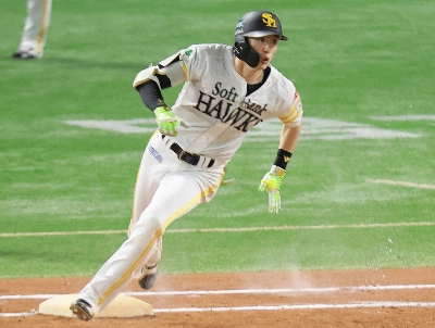 SoftBank's Ukyo Shuto rounds first base after hitting a double in the seventh inning at Mizuho PayPay Dome Fukuoka on Sunday. SoftBank's Ukyo Shuto rounds first base after hitting a double in the seventh inning at Mizuho PayPay Dome Fukuoka on Sunday.
