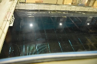 A storage pool for spent nuclear fuel at Japan Nuclear Fuel's reprocessing plant in the village of Rokkasho in Aomori Prefecture, on May 30. Radiation was detected inside the nasal cavity of one of three workers who had been sent to work in a controlled area of the plant. | JIJI