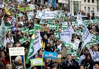 Protesters take part in a march in The Hague on Sunday to demand more action against climate change. | ANP / via AFP-JIJI