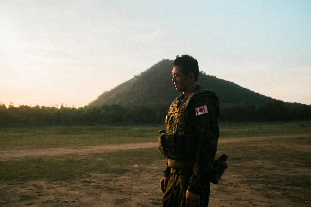 Ikken Yamamoto plays a shell-shocked Self-Defense Force veteran whose past comes back to haunt him in “Flames of a Flower.” Ikken Yamamoto plays a shell-shocked Self-Defense Force veteran whose past comes back to haunt him in “Flames of a Flower.”