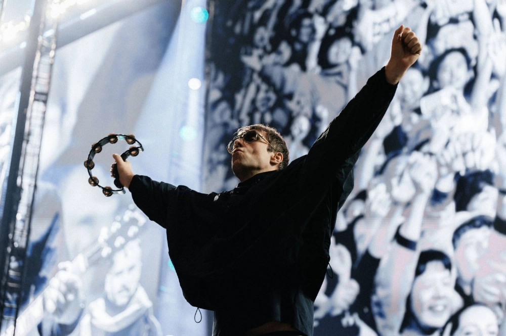 Liam Gallagher commanded the stage with effortless charisma during Oasis' Tokyo Dome set on Saturday. Liam Gallagher commanded the stage with effortless charisma during Oasis' Tokyo Dome set on Saturday.