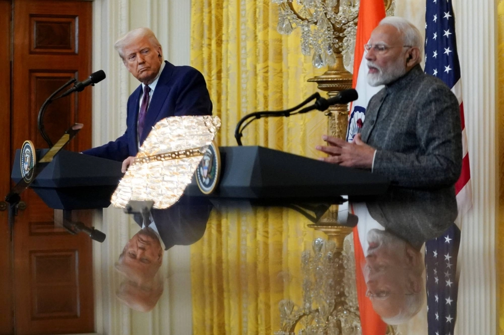 U.S. President Donald Trump and Indian Prime Minister Narendra Modi attend a joint press conference at the White House in Washington on Feb. 13. Modi is campaigning for his party in a crucial state election that kicks off next week, and is said to have been unwilling to risk a meeting with Trump at a regional leaders summit in Malaysia this week that could have damaged his party’s chances at the polls. U.S. President Donald Trump and Indian Prime Minister Narendra Modi attend a joint press conference at the White House in Washington on Feb. 13. Modi is campaigning for his party in a crucial state election that kicks off next week, and is said to have been unwilling to risk a meeting with Trump at a regional leaders summit in Malaysia this week that could have damaged his party’s chances at the polls.