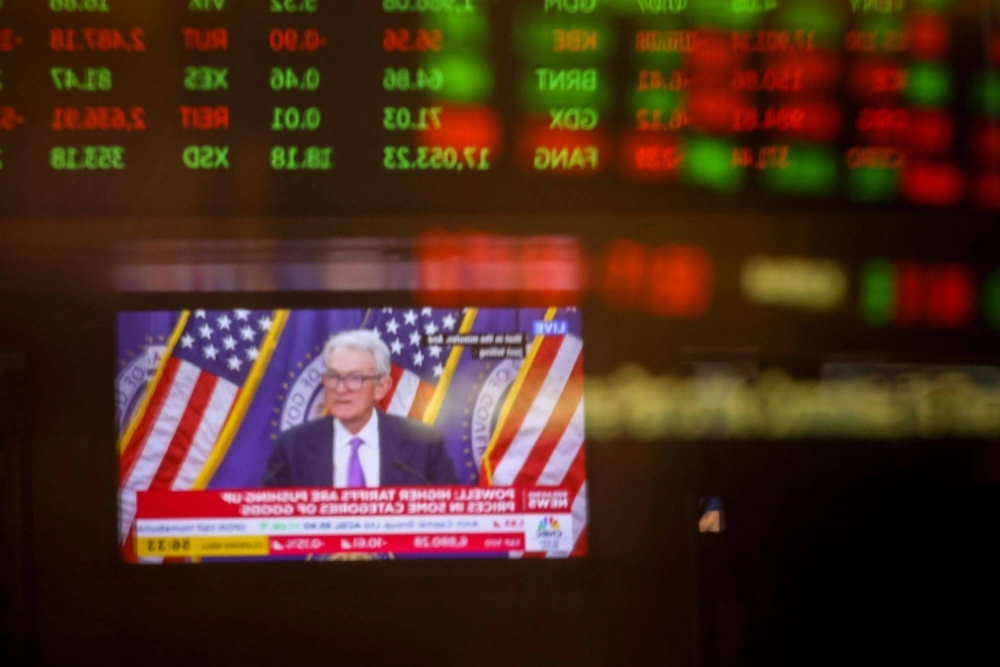 A television station broadcasts Jerome Powell, chair of the U.S. Federal Reserve, speaking after a Federal Open Market Committee meeting on the floor of the New York Stock Exchange on Wednesday. A television station broadcasts Jerome Powell, chair of the U.S. Federal Reserve, speaking after a Federal Open Market Committee meeting on the floor of the New York Stock Exchange on Wednesday.