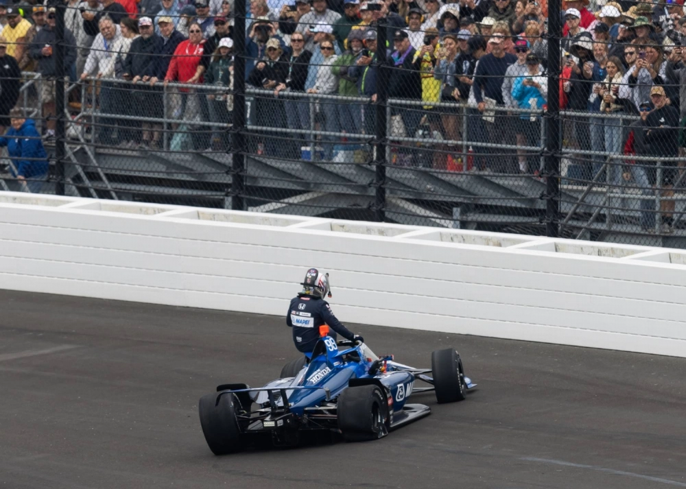 Marco Andretti climbs from his car after crashing during the 109th Running of the Indy 500 at Indianapolis Motor Speedway on May 25.  Marco Andretti climbs from his car after crashing during the 109th Running of the Indy 500 at Indianapolis Motor Speedway on May 25.