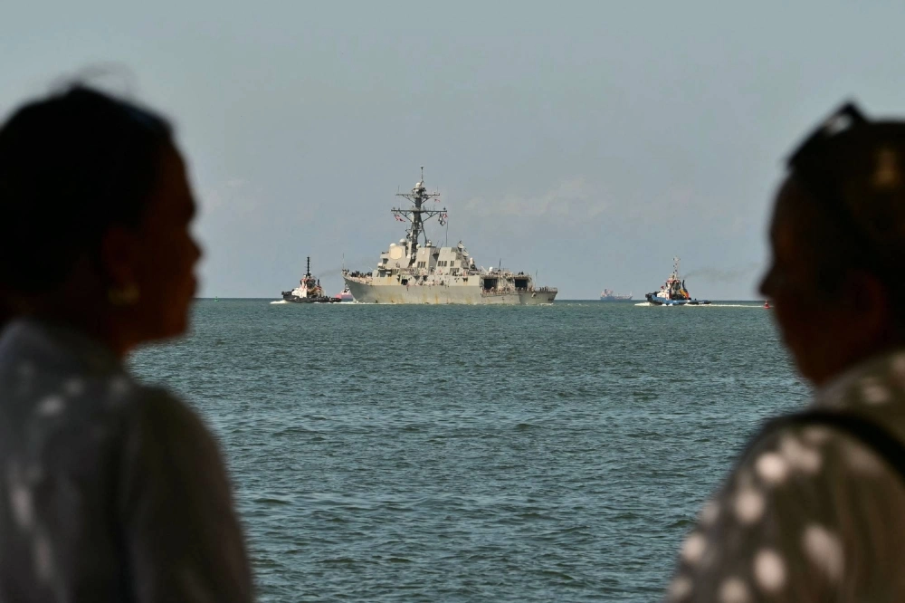 The USS Gravely, a U.S. Navy warship, is seen departing the Port of Spain on Thursday. The U.S. warship arrived in Trinidad and Tobago on Sunday for joint exercises near the coast of Venezuela. The USS Gravely, a U.S. Navy warship, is seen departing the Port of Spain on Thursday. The U.S. warship arrived in Trinidad and Tobago on Sunday for joint exercises near the coast of Venezuela.