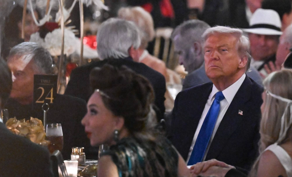 U.S. President Donald Trump attends a Halloween party at his Mar-a-Lago residence in Palm Beach, Florida, on Friday. U.S. President Donald Trump attends a Halloween party at his Mar-a-Lago residence in Palm Beach, Florida, on Friday.