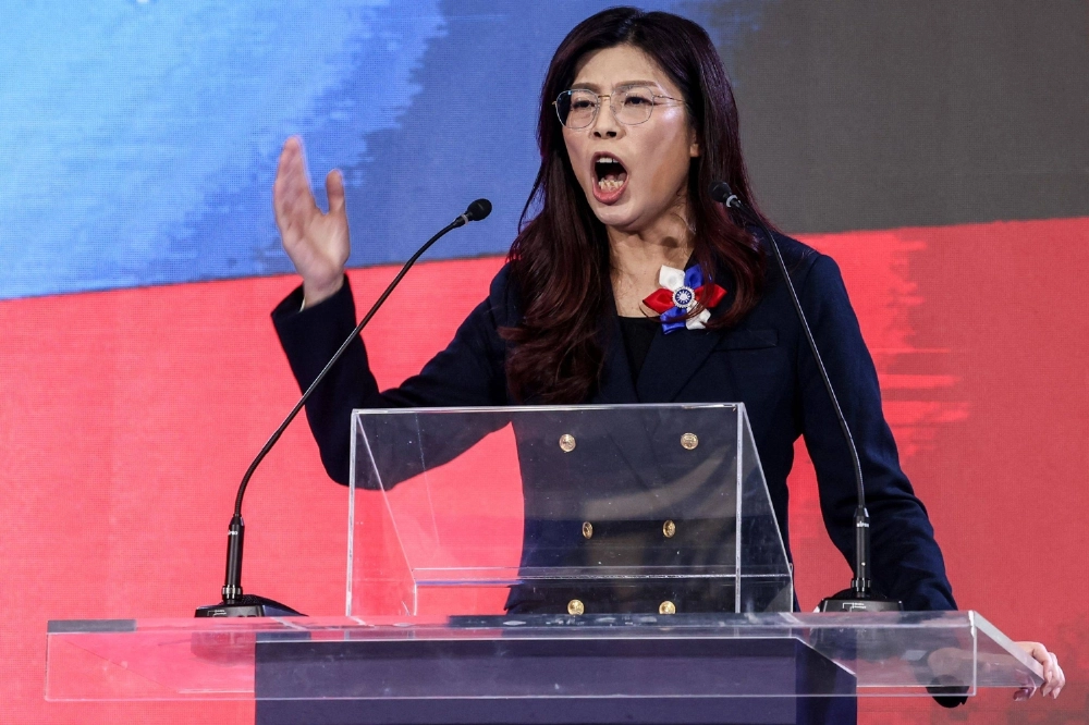 Newly elected opposition Kuomintang leader Cheng Li-wun delivers her speech during a party congress in Taipei on Saturday. Newly elected opposition Kuomintang leader Cheng Li-wun delivers her speech during a party congress in Taipei on Saturday.