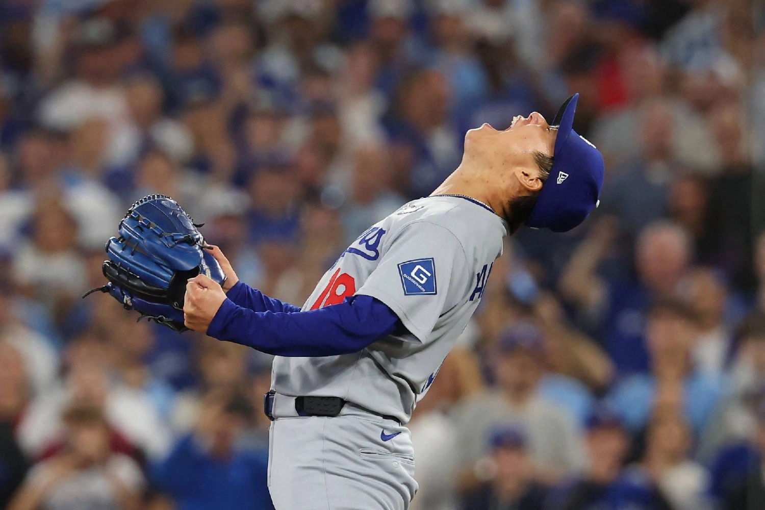 Yamamoto celebrates after the Dodgers secured their win on Sunday.  Yamamoto celebrates after the Dodgers secured their win on Sunday.
