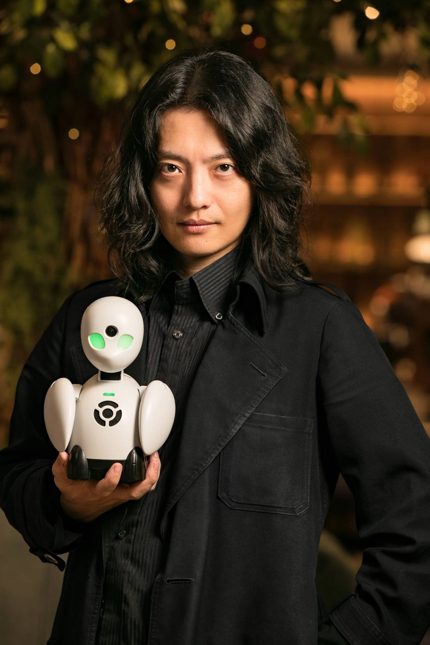 Ory Yoshifuji, co-founder of Ory Laboratory, holds OriHime, a robot that will aid in remote attendance for the Deaflympics. Ory Yoshifuji, co-founder of Ory Laboratory, holds OriHime, a robot that will aid in remote attendance for the Deaflympics.