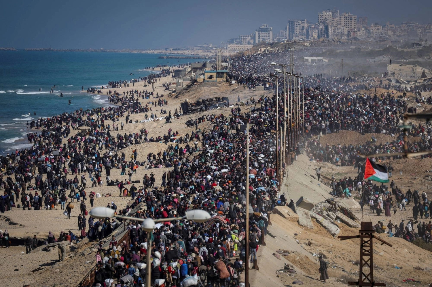 Palestinians, who were displaced to the south at Israel's order during the war, make their way back to their homes in northern Gaza, amid a ceasefire between Israel and Hamas. Palestinians, who were displaced to the south at Israel's order during the war, make their way back to their homes in northern Gaza, amid a ceasefire between Israel and Hamas.