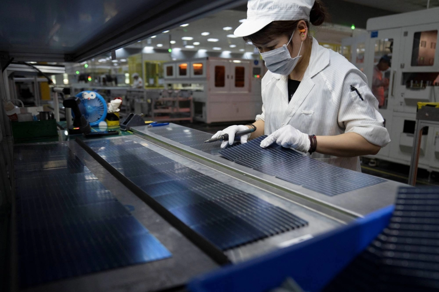An employee works on the production line of a solar panel factory in Hefei, China, in May 2024. When it comes to solar, wind and battery storage technologies, China dominates. An employee works on the production line of a solar panel factory in Hefei, China, in May 2024. When it comes to solar, wind and battery storage technologies, China dominates.