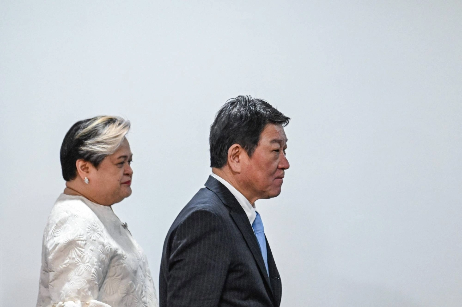 Foreign Minister Toshimitsu Motegi walks with Philippines Foreign Secretary Theresa Lazaro after a joint news conference in Pasay, Metro Manila, on Thursday. Foreign Minister Toshimitsu Motegi walks with Philippines Foreign Secretary Theresa Lazaro after a joint news conference in Pasay, Metro Manila, on Thursday.