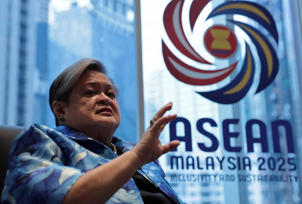 Philippines Foreign Secretary Theresa Lazaro speaks in Kuala Lumpur last July.