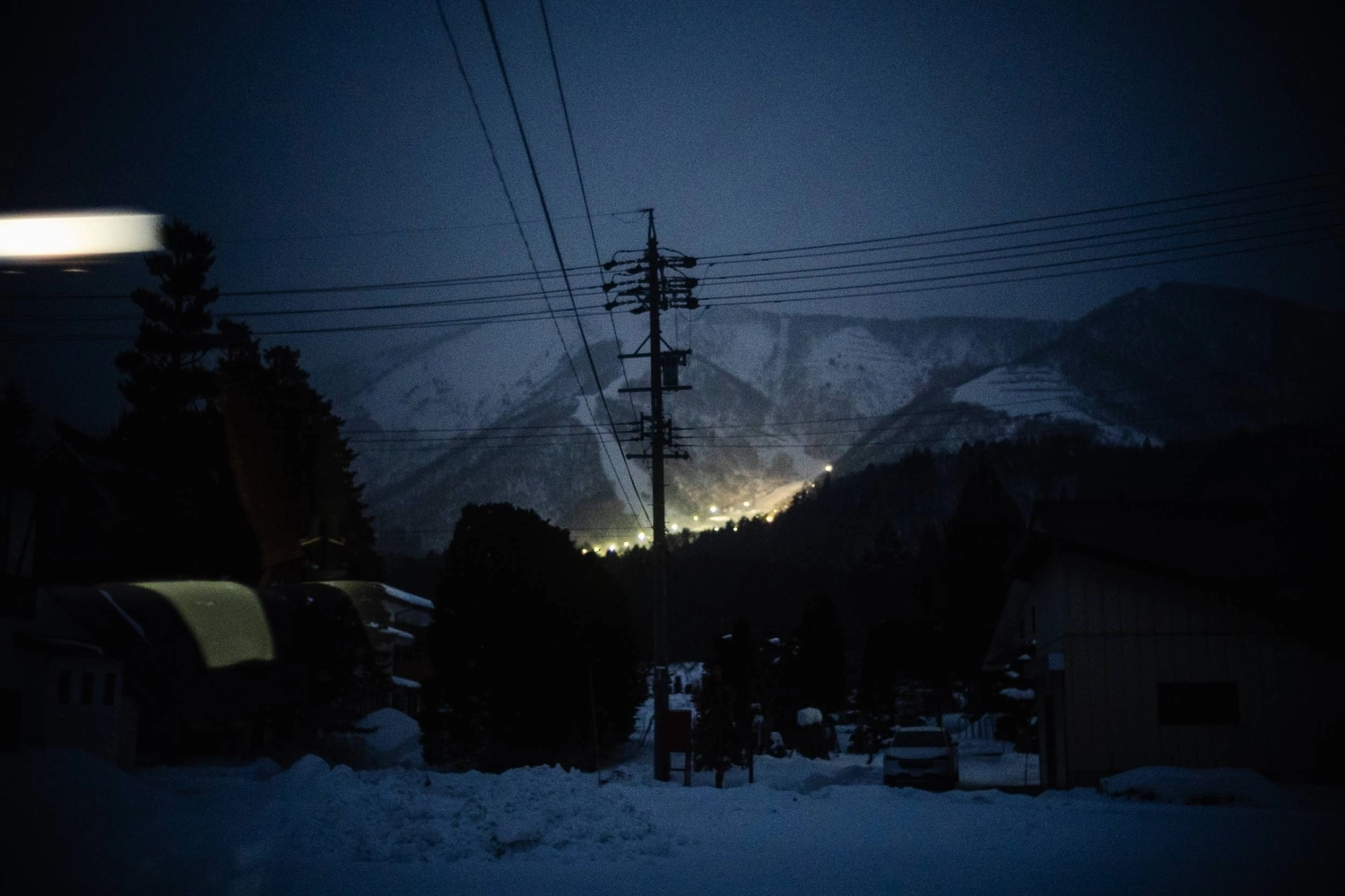Lights from the ski fields illuminate the night sky in Hakuba, while the sounds of foreign languages spill onto the streets well into the evening. Lights from the ski fields illuminate the night sky in Hakuba, while the sounds of foreign languages spill onto the streets well into the evening.