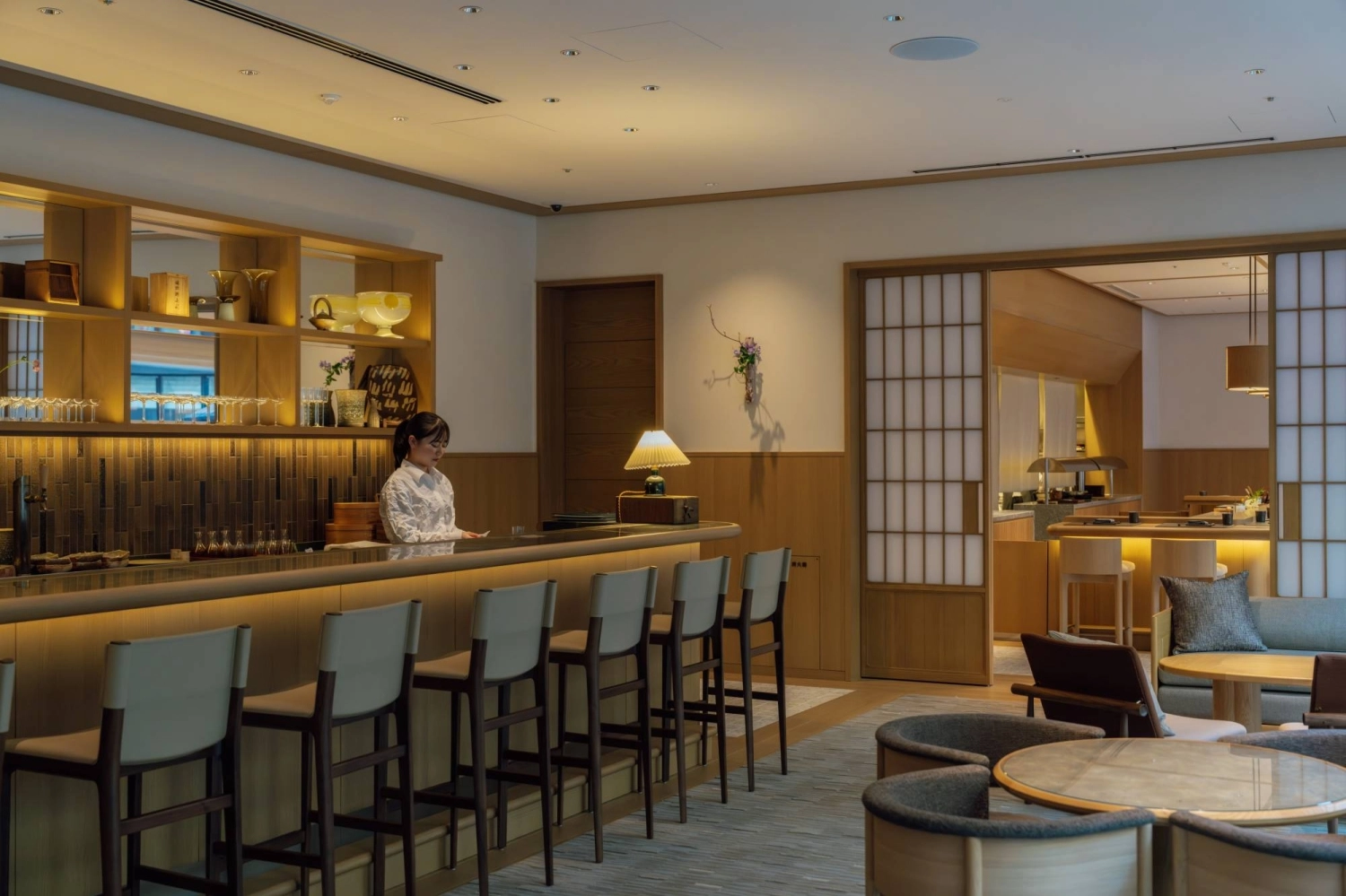 Located in Kyoto’s historic geisha district, the SoNoMa experience begins in the front room of the restaurant, where guests are served a welcome drink and a trio of small bites. Located in Kyoto’s historic geisha district, the SoNoMa experience begins in the front room of the restaurant, where guests are served a welcome drink and a trio of small bites.