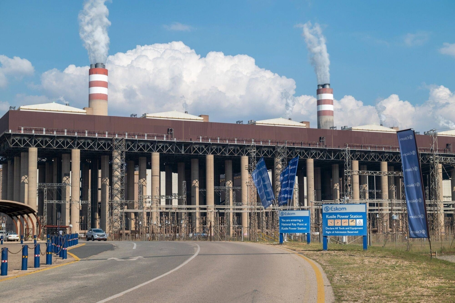 Cooling towers at the Eskom Holdings SOC Kendal coal-fired power plant in Mpumalanga, South Africa. Japan plans to provide a yen-denominated energy loan to South Africa.