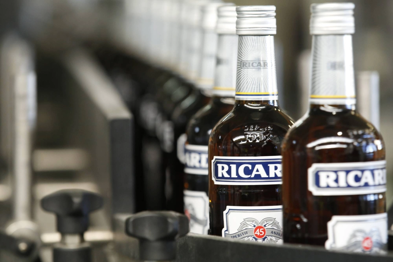 Pernod Pastis bottles at the Pernod Ricard SA plant in Vendeville, France