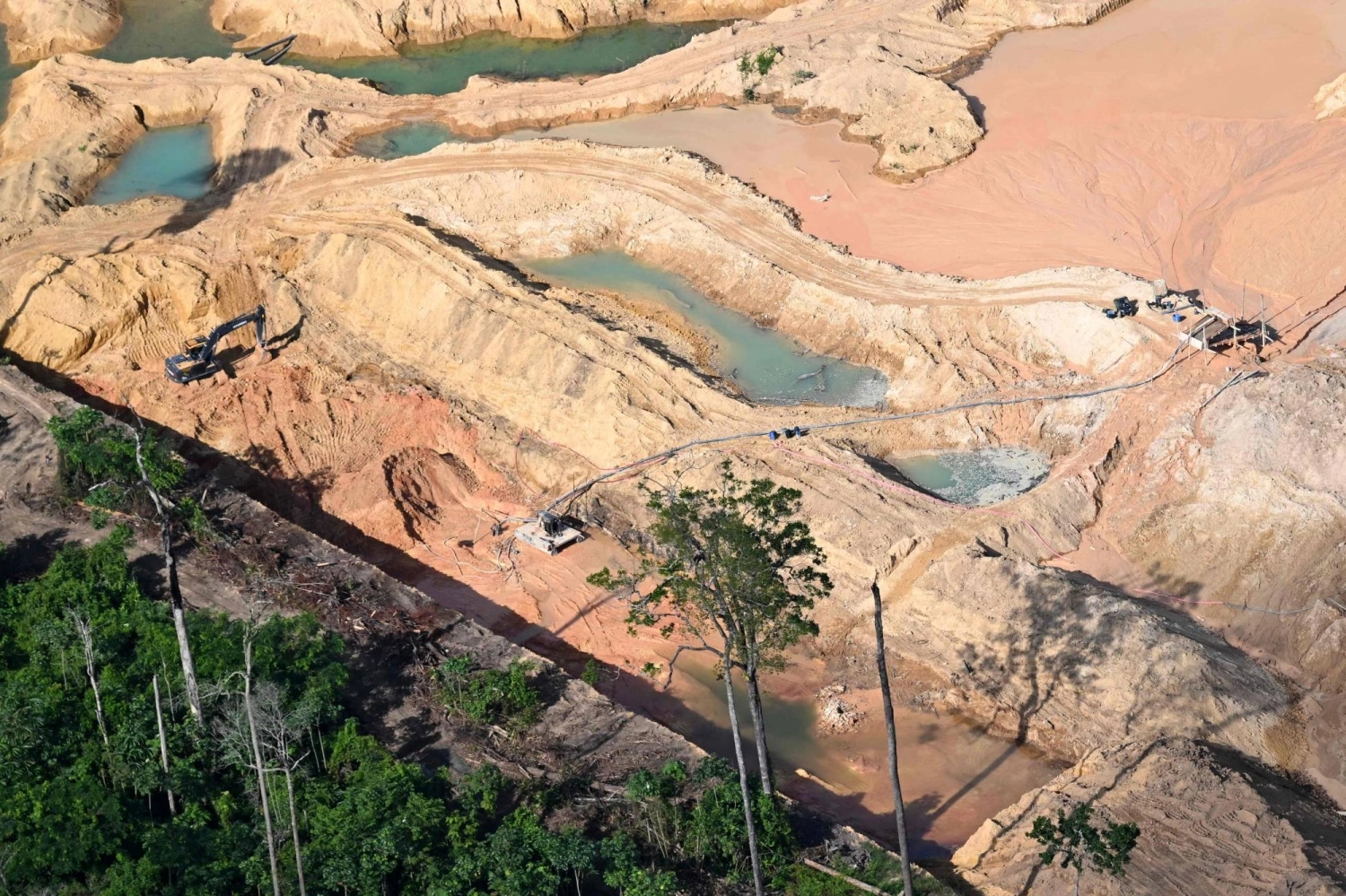 An illegal mining area at Rio Novo National Park, in the municipality of Itaituba, in the Amazon rainforest, in southwestern Para State, Brazil, on May 21 An illegal mining area at Rio Novo National Park, in the municipality of Itaituba, in the Amazon rainforest, in southwestern Para State, Brazil, on May 21