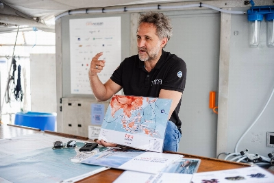 Image 28: Romain Troublé, the executive director of Tara Ocean Foundation, speaks to visitors aboard the Tara during a rare port call in Tokyo in April.