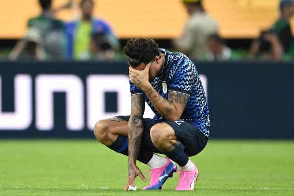 Image 14: Uruguay's Jose Maria Gimenez reacts after the team's loss against Spain at the 2026 FIFA World Cup on Friday.