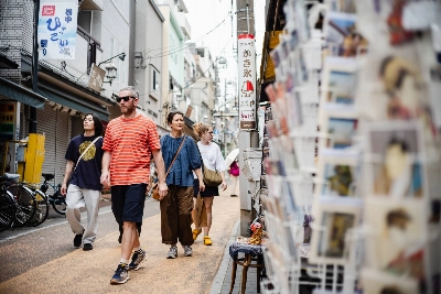 Image 20: Tourists in Yanaka Ginza, Tokyo, on Wednesday. Japan tripled its International Tourist Tax (departure tax) to ¥3,000 from ¥1,000 on Wednesday for all travelers leaving Japan, regardless of nationality.