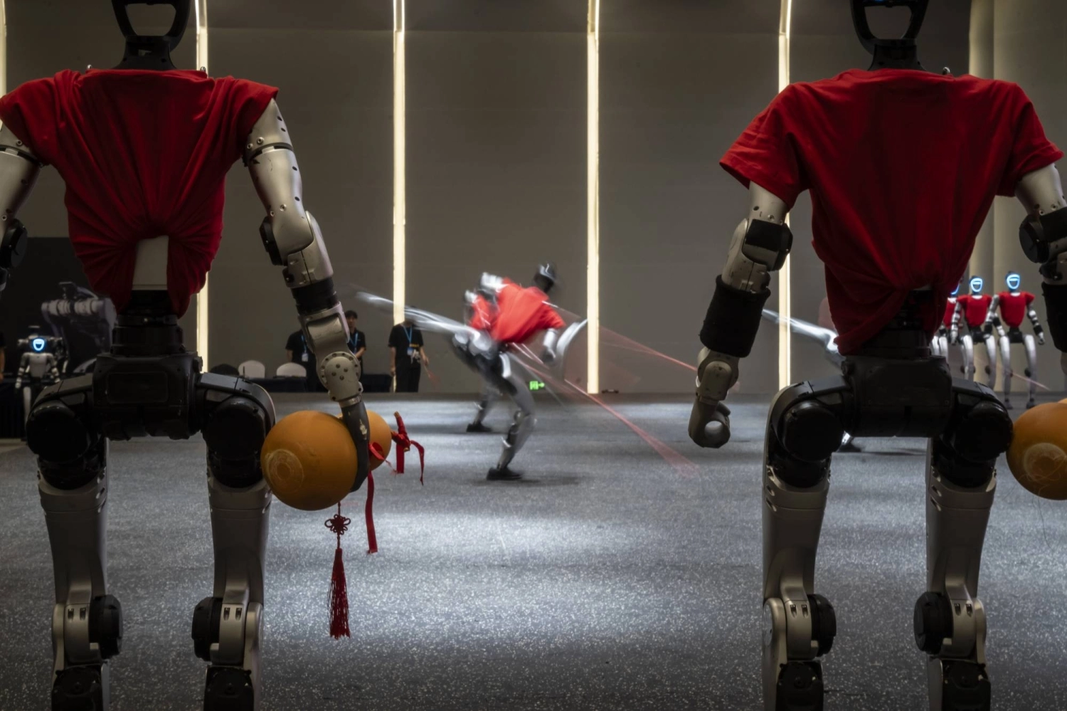 Unitree's G1 humanoid robots during a martial arts demonstration