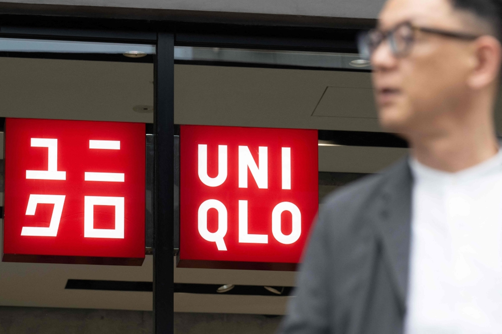 Shares of Uniqlo’s parent firm dive 7pc after weak performance in China ...