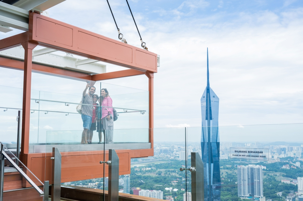 Dare to look down: KL Tower’s new Glass Box lets visitors step into the ...