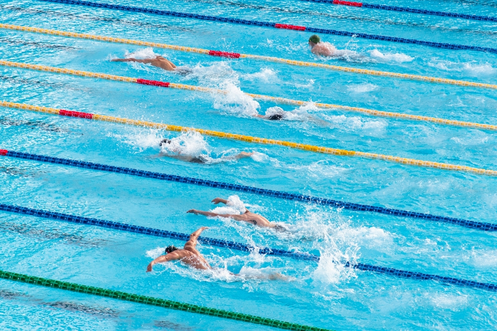 Singapore charges three ex-coaches over forged fin swimming results ...