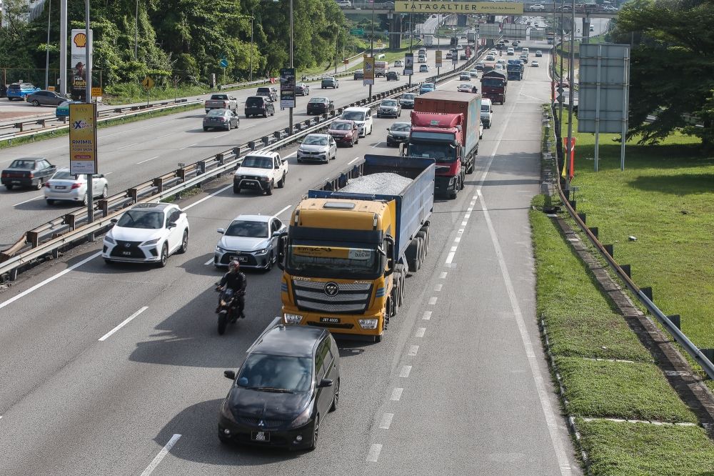 We cannot hold: Truckers warn of rising costs, halted projects as diesel surge Lorries are seen on the Federal Highway in this file picture dated January 2, 2025. — Picture by Yusof Mat Isa