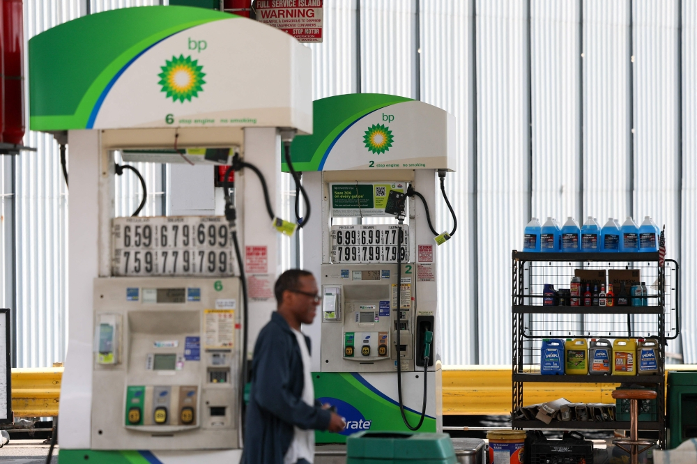 Americans say rising gas prices show the personal cost of Iran war Gas prices are displayed at the pumps at a gas station in the Manhattan borough of New York on March 31, 2026. — AFP pic