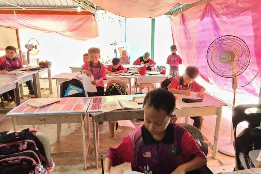Education Ministry to relocate SK Balaban Jaya students after safety concerns over ground movement Classrooms at the school currently include wall-less tents and corridors of a mosque, as the school does not yet have a complete permanent building. — The Borneo Post pic