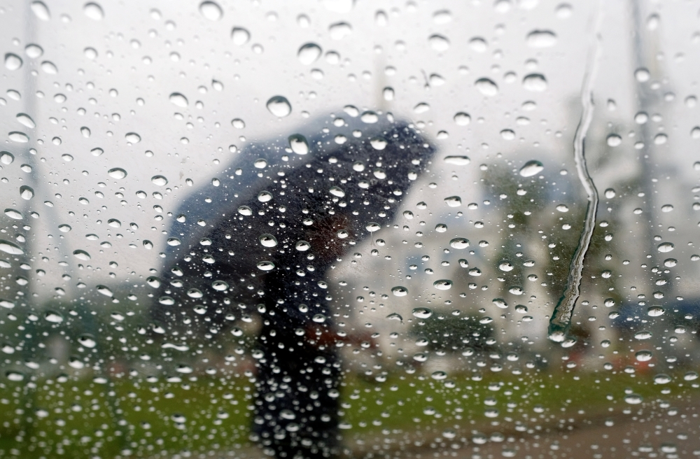 Brace for evening thunderstorms: MetMalaysia warns of heavy downpours across the country A person holds an umbrella as it rains in Kuantan, Pahang, on March 4, 2023. — Bernama pic
