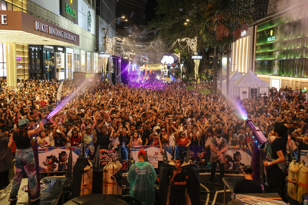 How Rain Rave took over Bukit Bintang with massive crowds and viral moments (VIDEO) The Rain Rave Water Music Festival (RRWMF) officially wrapped up after three days of soaking-wet festivities and non-stop music. — Picture by Yusof Isa