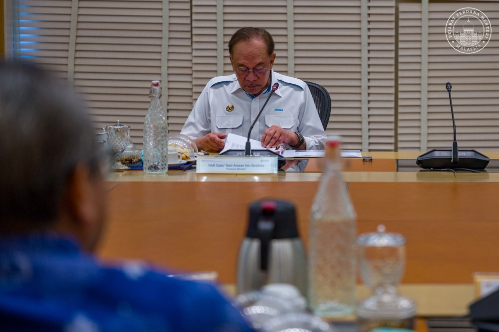 Anwar orders all ministries to retarget aid and protect vulnerable Malaysians from rising costs Prime Minister Datuk Seri Anwar Ibrahim chairs a meeting of the National Economic Action Council (MTEN) in Putrajaya on May 12, 2026. — PMO pic