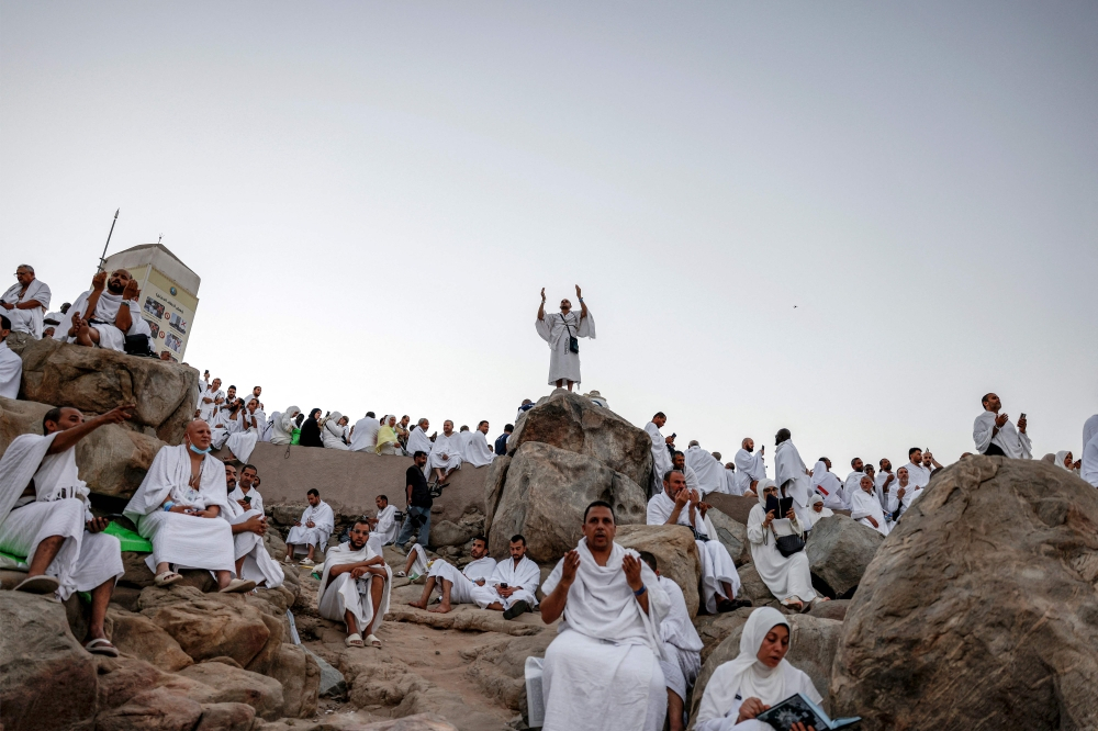 More than 1.7 million pilgrims converge on Mount Arafat for climax of Haj Muslim pilgrims pray on Saudi Arabia’s Mount Arafat, also known as Jabal al-Rahma or Mount of Mercy, during the climax of the Haj pilgrimage early on May 26, 2026. — AFP pic