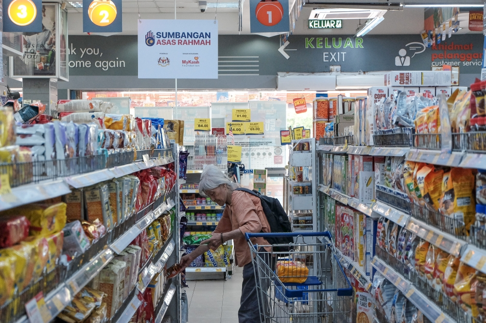 Brace for impact: Malaysian retailers warn worst price increases still coming as US-Iran war festers A woman shops browses items at a supermarket in Bukit Jelutong on September 3, 2025. — Picture by Yusof Isa