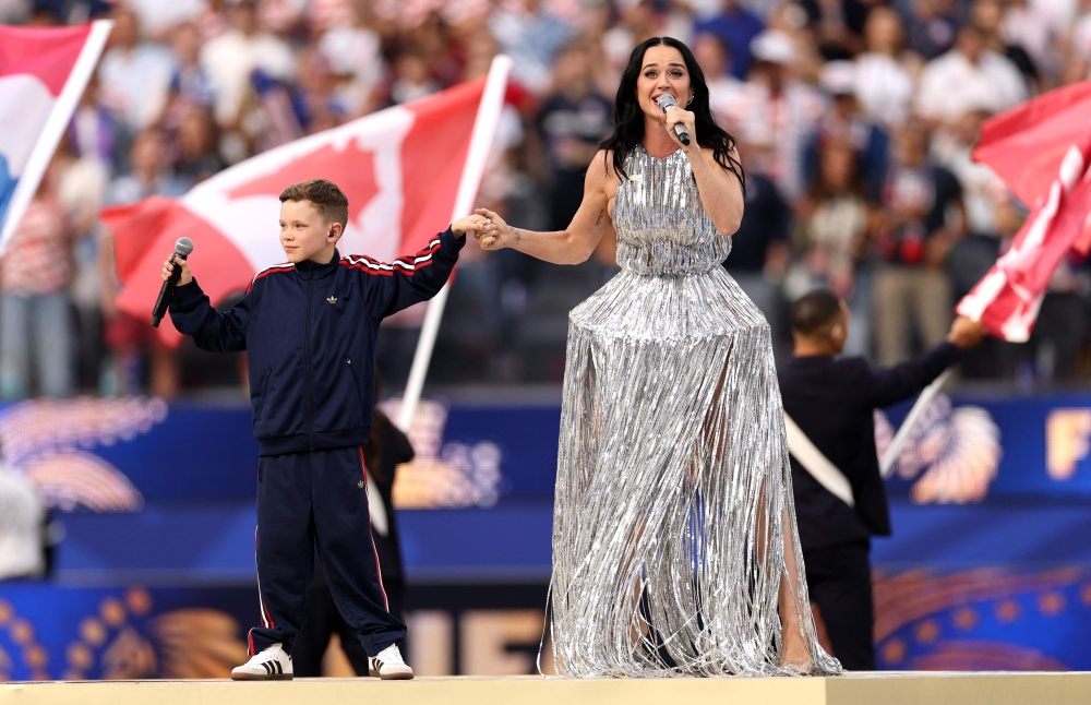 An astronaut, movie stars and a knight: Cruise, DiCaprio and Beckham pack the stands as Katy Perry, Lisa perform at LA World Cup opener | Malay Mail