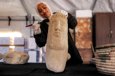 Paintbrushes and plastic boxes safeguard Gaza’s cultural treasures as bombs flatten landmarks Armed with paintbrushes and wearing surgical gloves, volunteers inside a large tent in Gaza delicately brushed dust from a stone mosaic before placing it into storage, part of an effort to preserve cultural heritage hit by war. — AFP pic