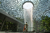 Changi Airport shoplifting spree: British man arrested after hitting six retail outlets A family walks past the rain vortex at Jewel Changi Airport in Singapore on June 23, 2021. — AFP pic