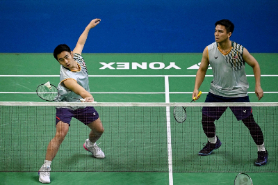 Malaysia’s Japan Open dreams dashed as top seeds reign supreme in semi-finals Goh Sze Fei-Nur Izzuddin were unable to overcome world number one pair Kim Won Ho-Seo Seung Jae of South Korea, even though they fought hard throughout the 58-minute match. — AFP pic