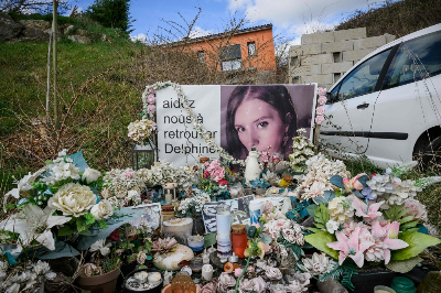 Confession cracks one of France’s most haunting missing person cases after husband jailed for 30 years Flowers, candles and a portrait of Delphine Jubillar, a 33-year-old French nurse who went missing in 2020, are placed outside the family home in Cagnac-les-Mines. Her husband later confessed to her killing and led investigators to her remains. — AFP pic