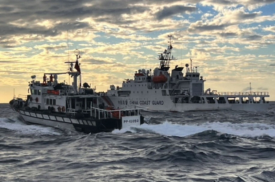Taiwan warns of China’s ‘Anaconda Strategy’ as ship incursions jump in June This is a handout photo taken on December 29, 2025 and released on December 30, 2025 by the Taiwan Coast Guard shows a Taiwanese coast guard ship (left) sending warnings to a Chinese coast guard ship in the waters off Taiwan’s Cape Fugui. — AFP pic