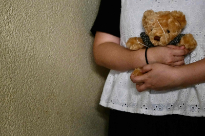 ‘Why didn’t you fight back?’: The question Hong Kong’s sexual assault survivors want banned Bobo, a survivor of persistent childhood sexual abuse, holds a teddy bear during an interview in Hong Kong on June 16, 2026. — AFP pic