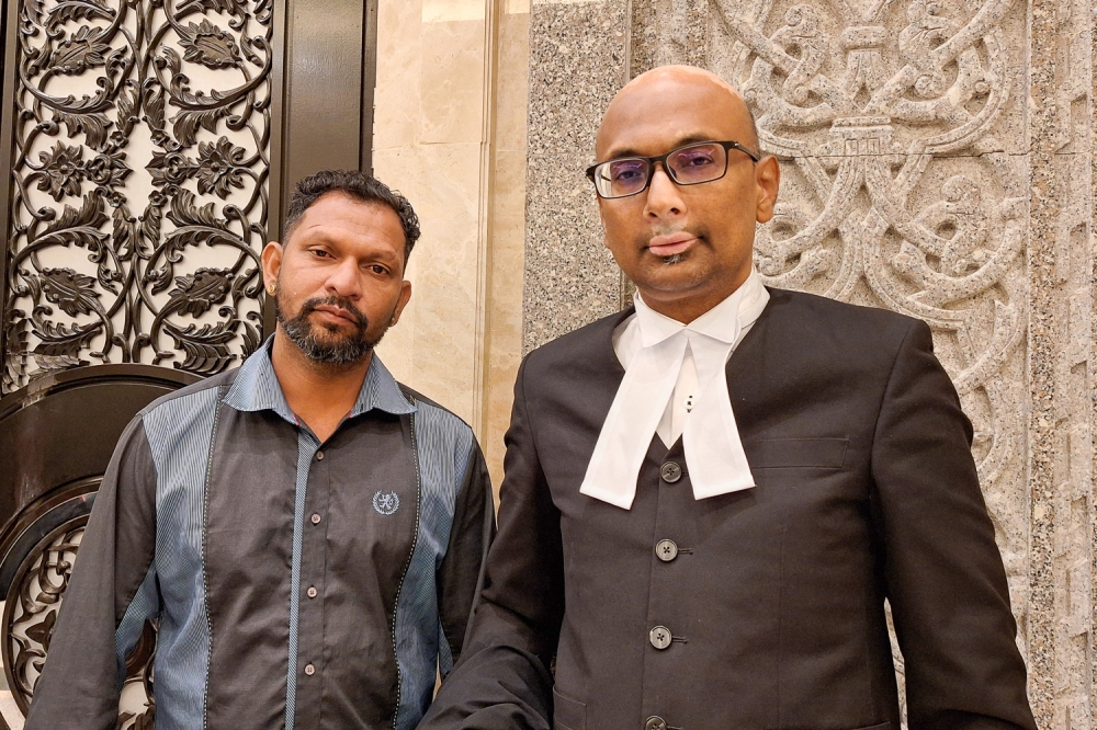 Perak man loses citizenship appeal despite having Malaysian aunt, uncles; as pre-Merdeka-born mother’s status undecided Perak-born Velmurugan (left) is seen here with his lawyer Annou Xavier at the Court of Appeal on January 21, 2026. — Picture by Ida Lim