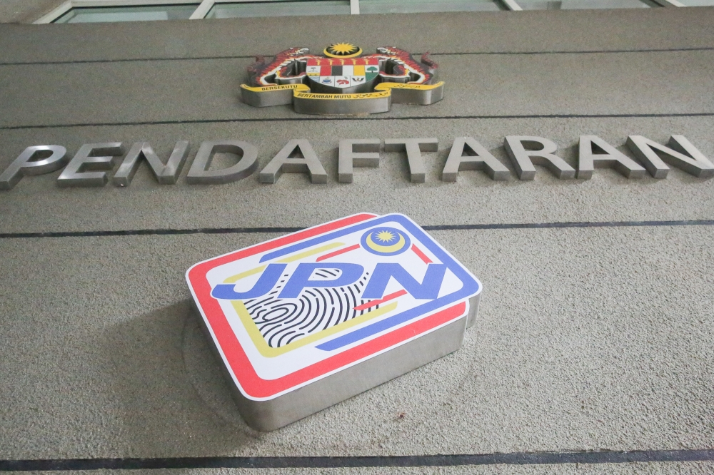 Advocacy group DHRRA urges reform after court denies citizenship to Malaysia-born children The National Registration Department logo is displayed outside its headquarters in Putrajaya. — Picture by Choo Choy May