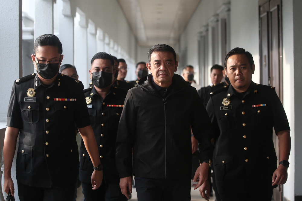Prosecution to call 25 witnesses in former Army chief’s money laundering trial Muhammad Hafizuddeain, 58, has been charged with six counts of receiving RM2.26 million in alleged proceeds from unlawful activities, involving deposits made into his bank accounts at various locations between Feb 2, 2024, and Nov 7, 2025. — Picture by Yusof Isa