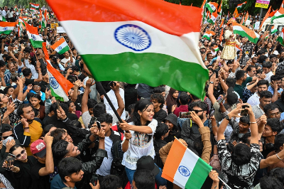 India’s youth protests puncture Modi’s aura of political invincibility Cockroach Janta Party (CJP) supporters wave national flags a day after the resignation of India’s Education Minister Dharmendra Pradhan in Mumbai on July 26, 2026, as protests over alleged NEET exam irregularities were called off. — AFP pic